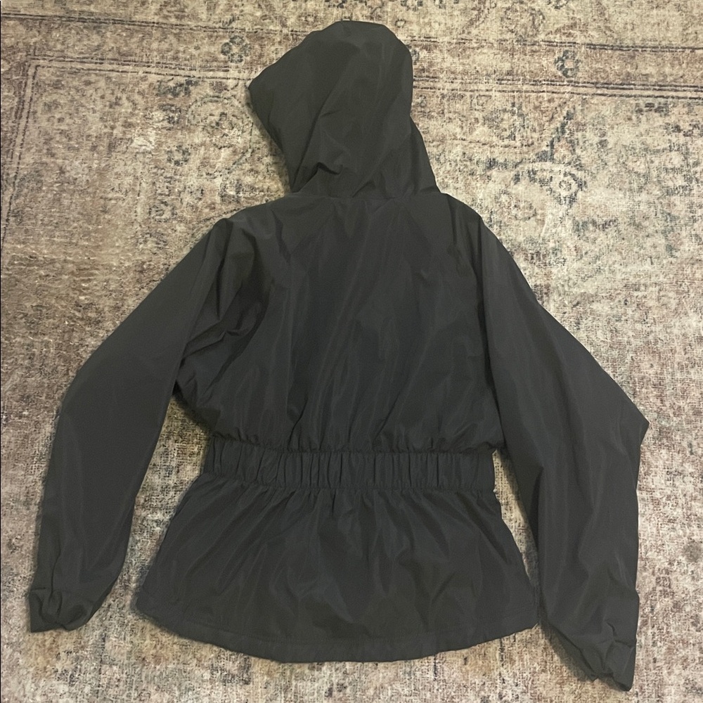 Sweaty Betty Storm Seeker Waterproof Hooded Jacket in Dark Green - Picture 9 of 9
